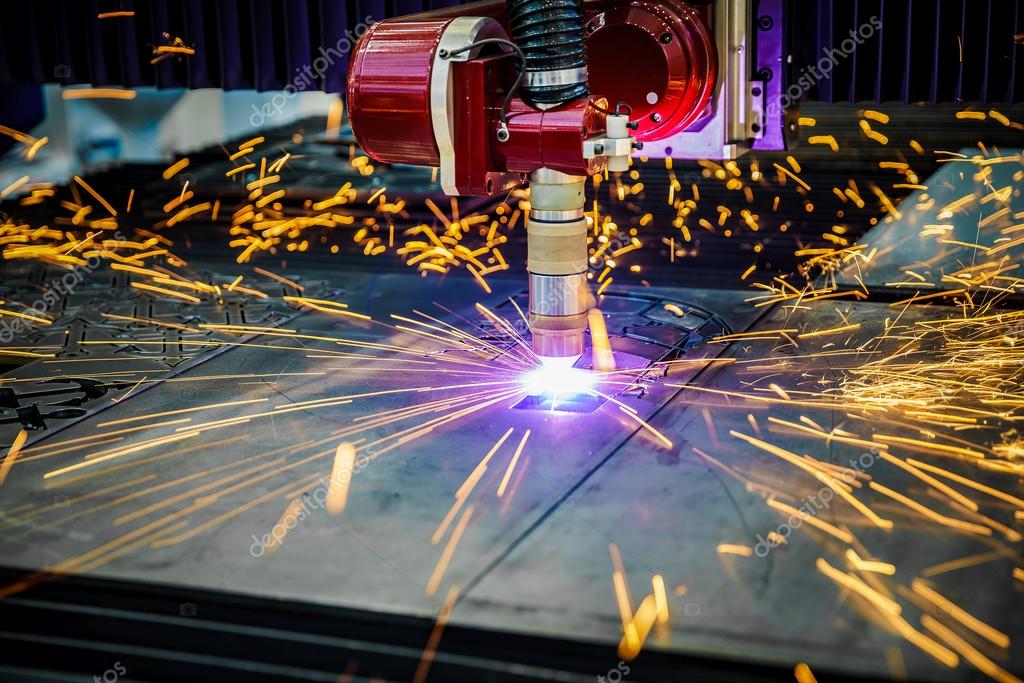 CNC Laser plasma cutting of metal, modern industrial technology. Stock