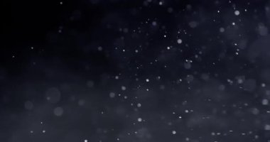 Karanlık arkaplanda soyut parçacık bokeh 'i yüzdürür