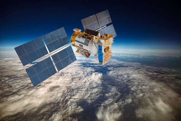 Космический спутник, вращающийся вокруг Земли. Элементы этого изображения предоставлены НАСА.