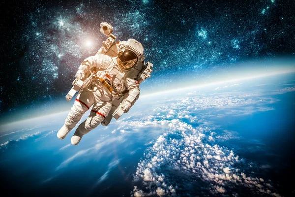 Astronaut in outer space — Stock Photo, Image
