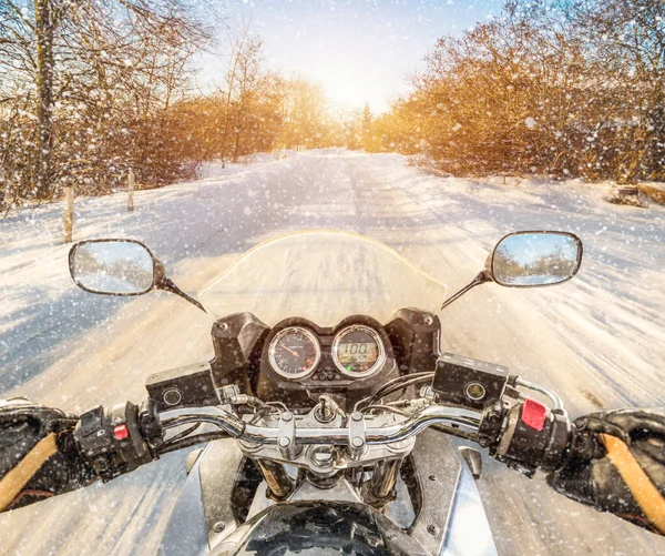 Biker First-person view. Winter slippery road — Stock Photo, Image