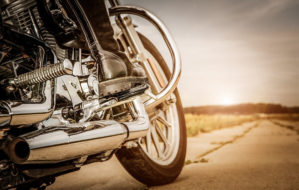 Biker girl riding on a motorcycle