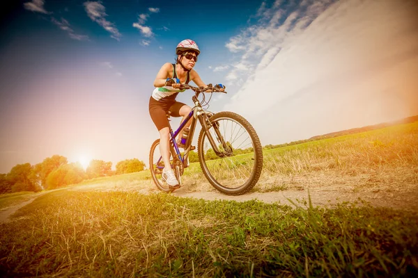 Women on bike — Stock Photo, Image