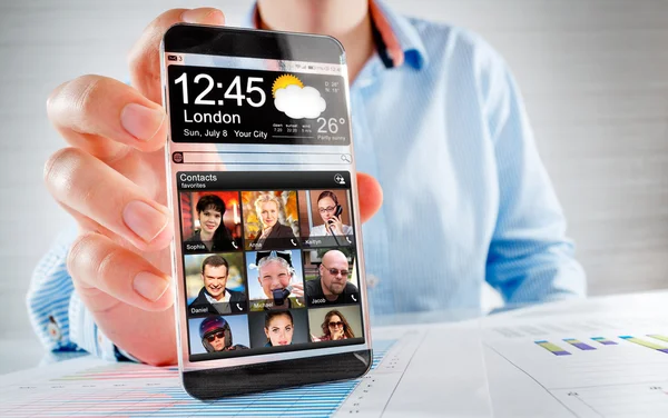 Smartphone with transparent screen in human hands. — Stock Photo, Image