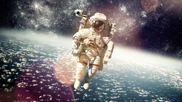 Astronaut in outer space — Stock Photo, Image