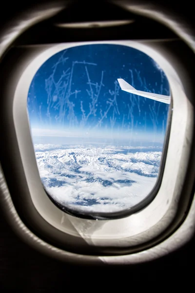Frost on the Airplane glass window. — Stock Photo, Image