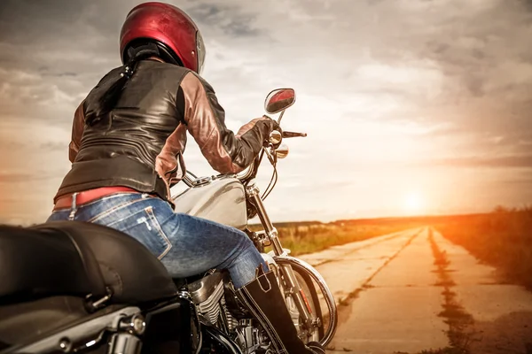 Biker girl on a motorcycle — Stock Photo, Image