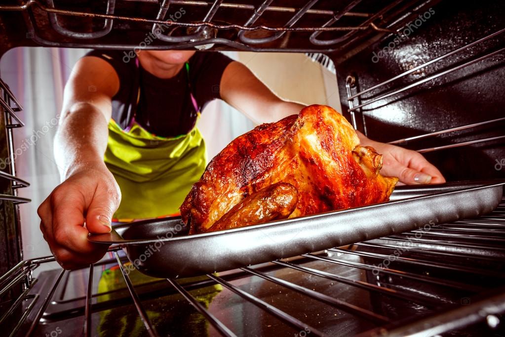 Cooking chicken in the oven at home. Stock Photo by ©cookelma 72876083