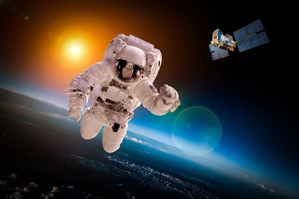 Astronaut in outer space — Stock Photo, Image