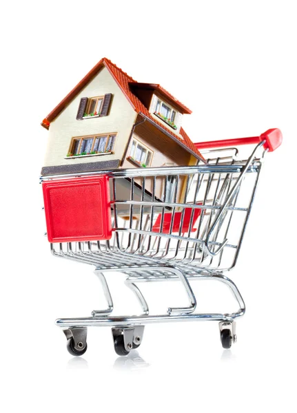 Shopping cart and house — Stock Photo, Image