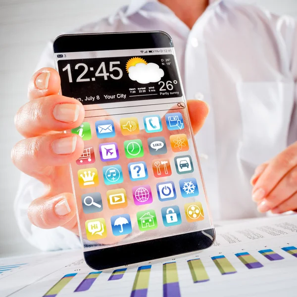Smartphone med transparent skärm i mänskliga händer. — Stockfoto