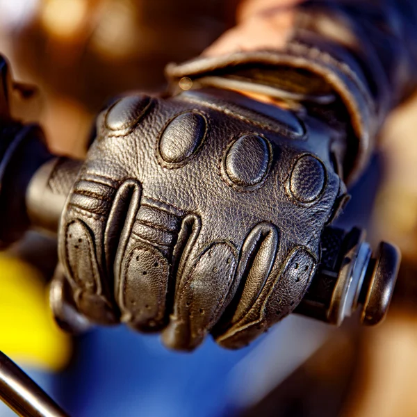 hand in a Motorcycle Racing Glove