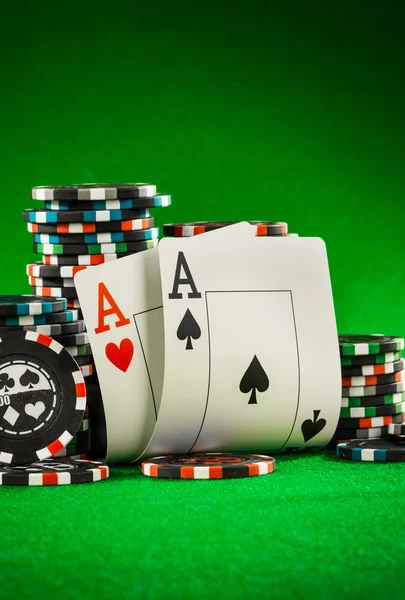 Stack of chips and two aces — Stock Photo, Image