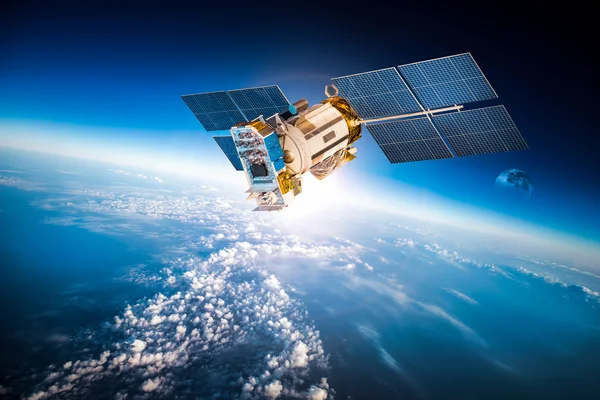 Space satellite orbiting the earth — Stock Photo, Image