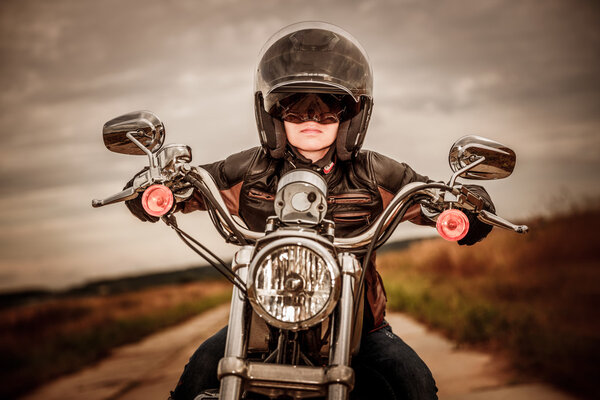 Biker girl on a motorcycle