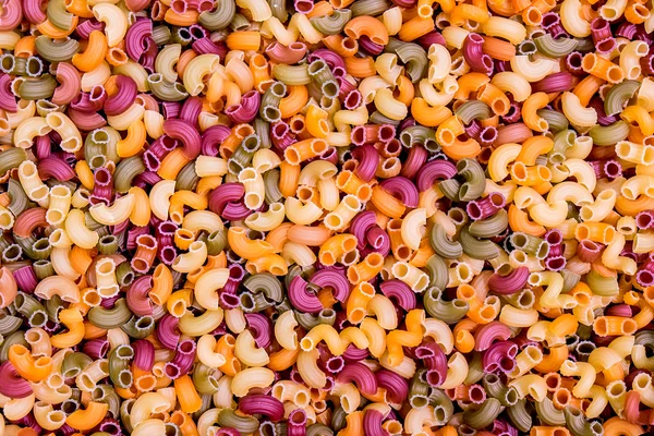 Background from multicolored pasta — Stock Photo, Image