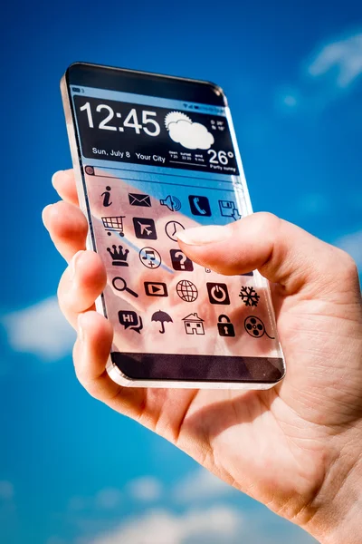 Smartphone mit transparentem Bildschirm in menschlicher Hand. — Stockfoto