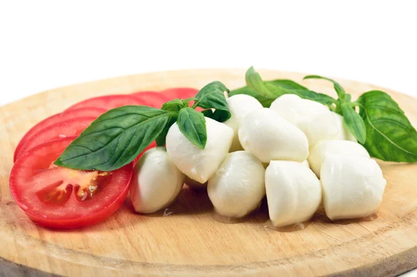 Mozzarella tomatoes basil — Stock Photo, Image