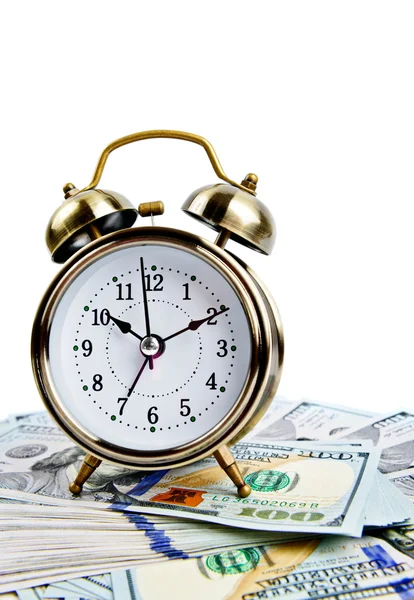 Alarm clock over money — Stock Photo, Image