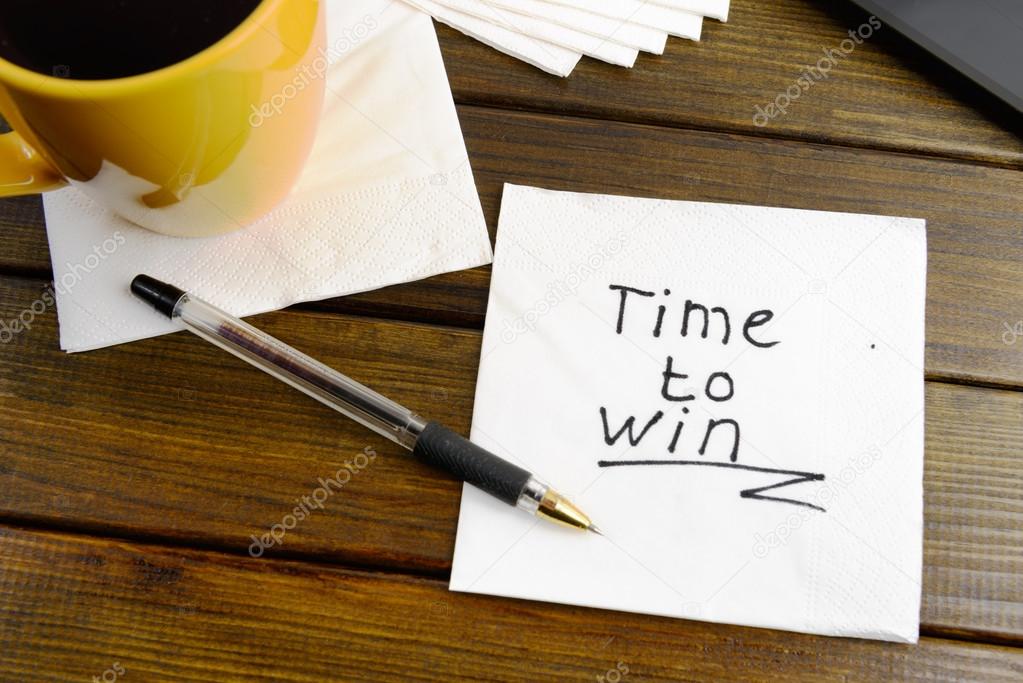Time to win think positive -  handwriting on a napkin
