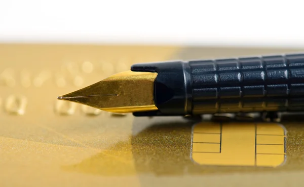 Pen on bank card — Stock Photo, Image