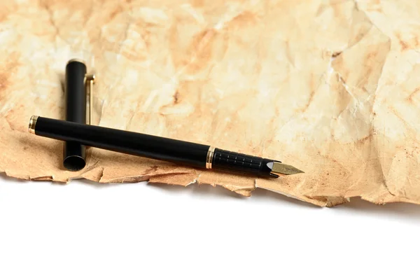 Ink fountain pen on grunge old paper — Stock Photo, Image