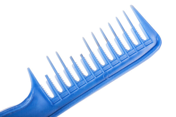 Dirty and broken hair comb isolated on white, macro