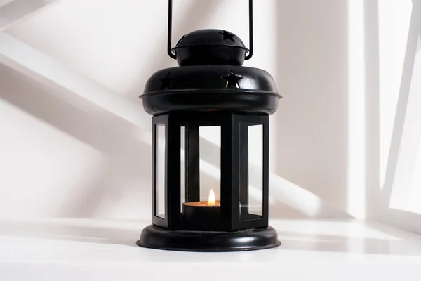 Lantern for candles, interior and decor in the room — Stock Photo, Image