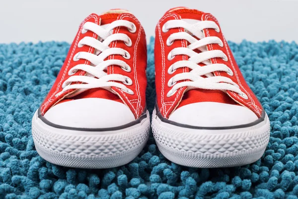 Fashionable red Converse sneakers — Stock Photo, Image