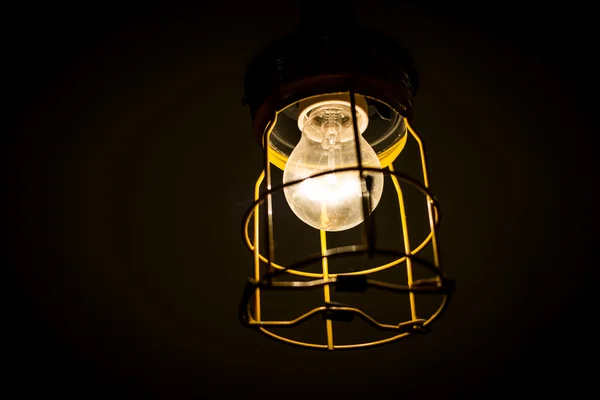 Incandescent old industrial lamp — Stock Photo, Image