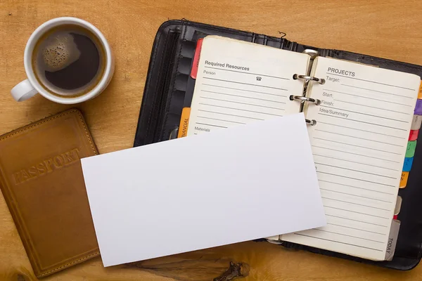 Diario aperto, passaporto e una tazza di caffè — Foto Stock