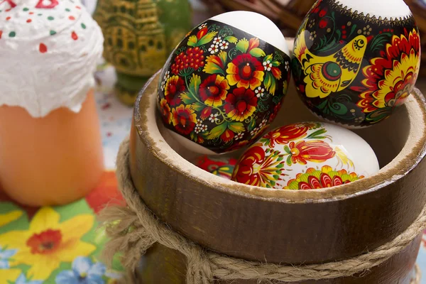 Easter eggs in a wooden bowl — Stock Photo, Image