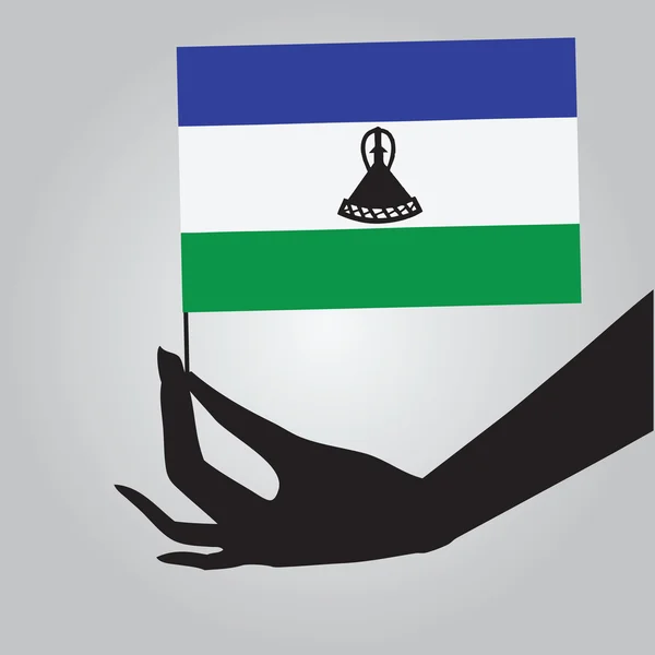 Mano con bandiera Lesotho — Vettoriale Stock