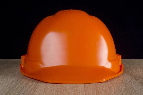 Industriel orange hjelm - Stock-foto