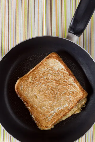 Toast on frying pan — Stock Photo, Image