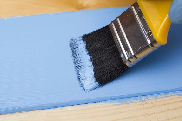 Painting with a paint brush — Stock Photo, Image