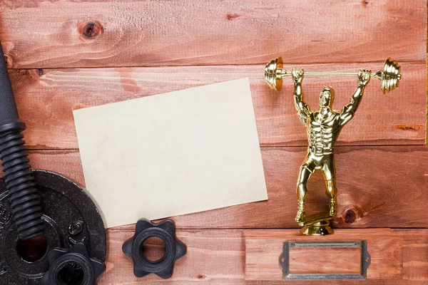 Figure weightlifter dumbbells — Stock Photo, Image