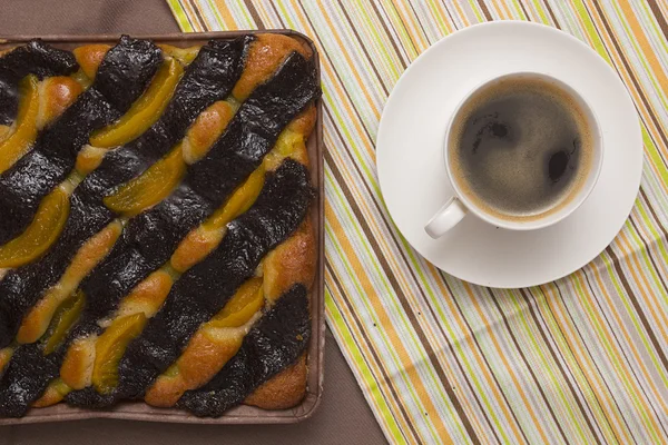 Coffee and cake with poppy seeds and orange