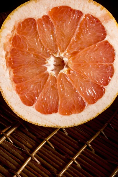 Cut half of juicy ripe grapefruit — Stock Photo, Image