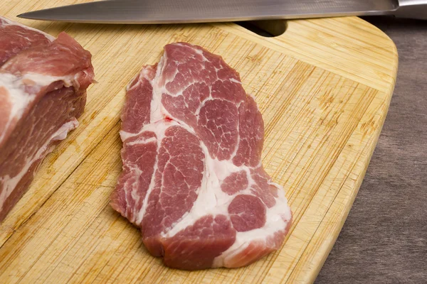 Cerdo de carne cruda en rodajas — Foto de Stock