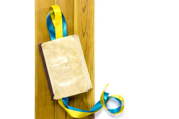 Yellow and blue satin ribbons book — Stock Photo, Image