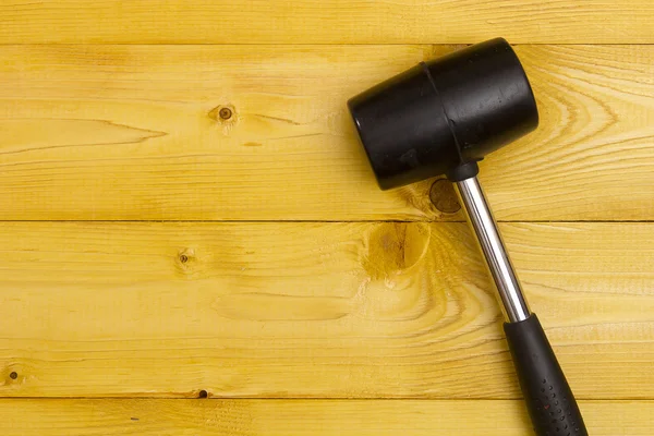 Black rubber mallet — Stock Photo, Image