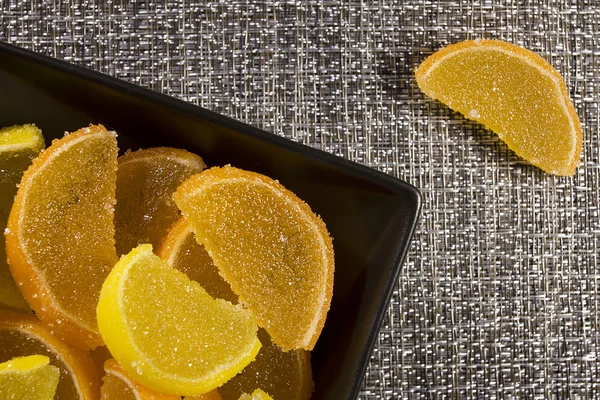 Zumo de caramelo como rodajas de limón y naranja — Foto de Stock