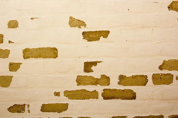 Brick wall with old painting — Stock Photo, Image