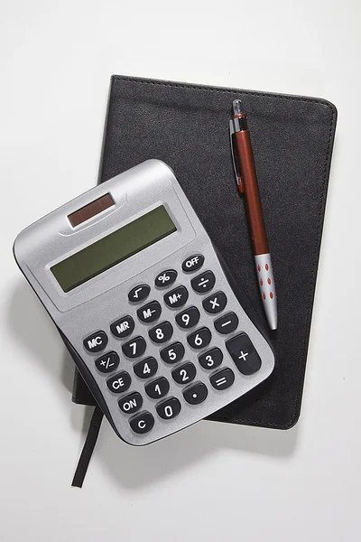 Calculadora con bloc de notas — Foto de Stock