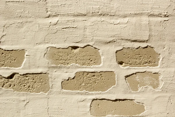 Brick wall with old painting — Stock Photo, Image