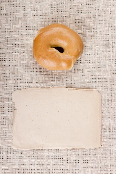 Mantequilla un bollo redondo - Bagel —  Fotos de Stock