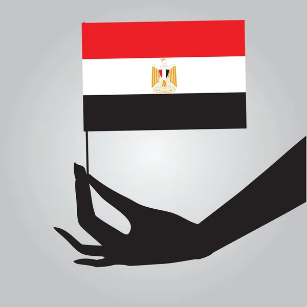 Hand mit ägyptischer Flagge — Stockvektor