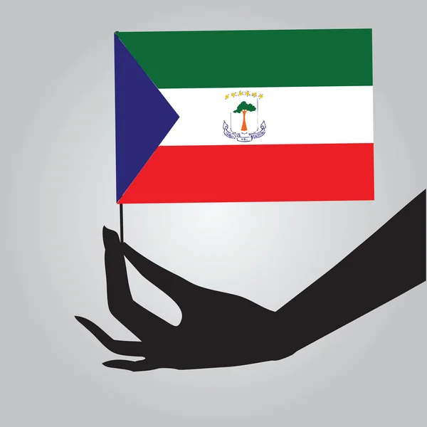赤道ギニアの旗を持つ手 — ストックベクタ