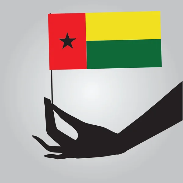 Mano con bandera Guinea-Bissau — Vector de stock